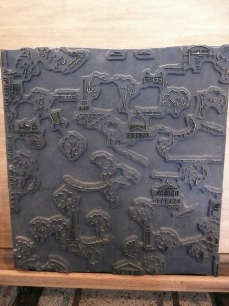 Printers art plaque featuring key Paris monuments c.1940