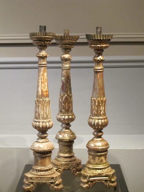 19th century italian giltwood torcheres (candlesticks) on trefoil base