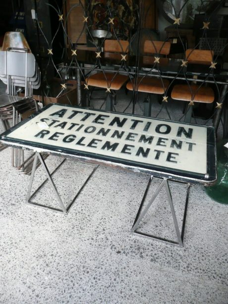 Coffee table made from French sign on chrome trestles