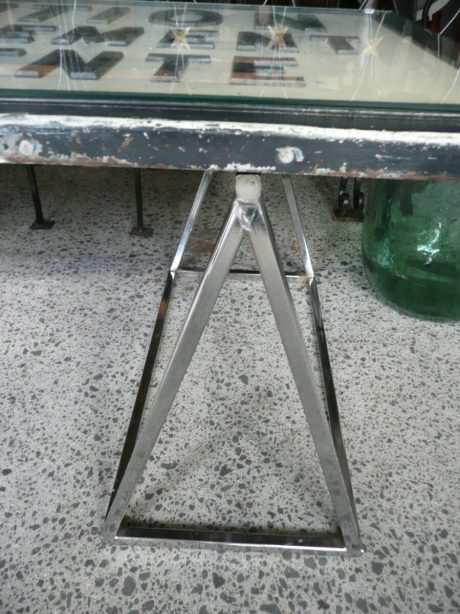 Coffee table made from French sign on chrome trestles