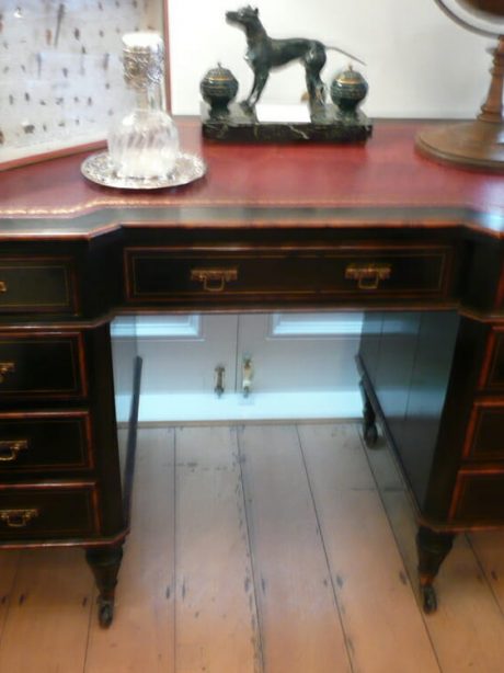 Ebonised mahogany desk with walnut trim and brass inlay  c.1890