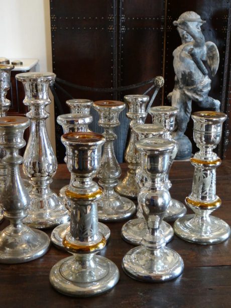 Large collection of antique mercury glass candlesticks