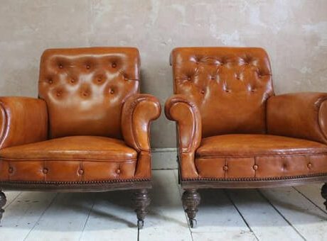 Generous pair of Edwardian leather armchairs