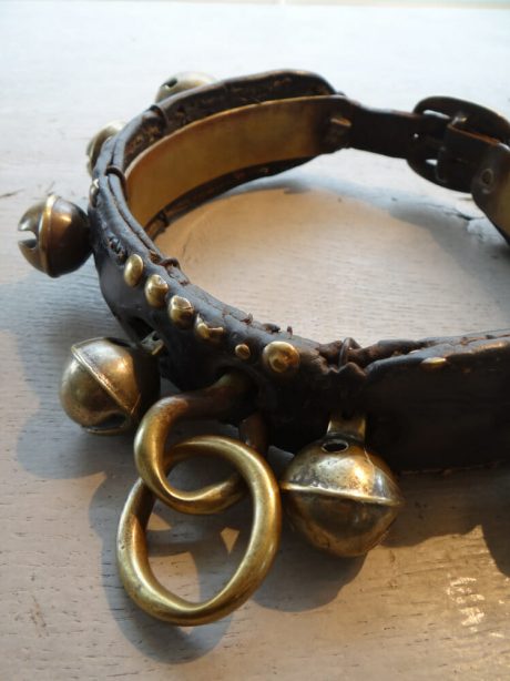 Antique brass bell and leather collar