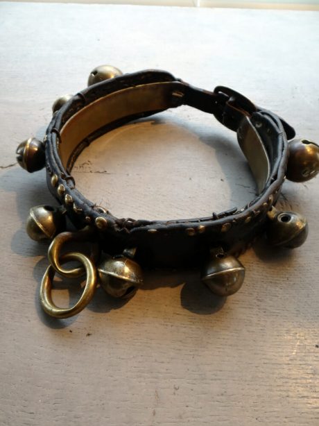 Antique brass bell and leather collar