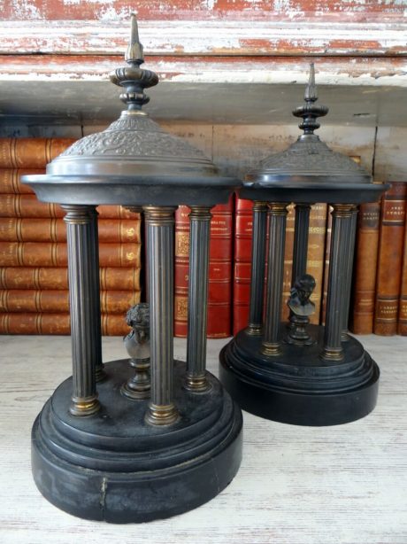 A pair of Victorian Classical style figural busts under domes