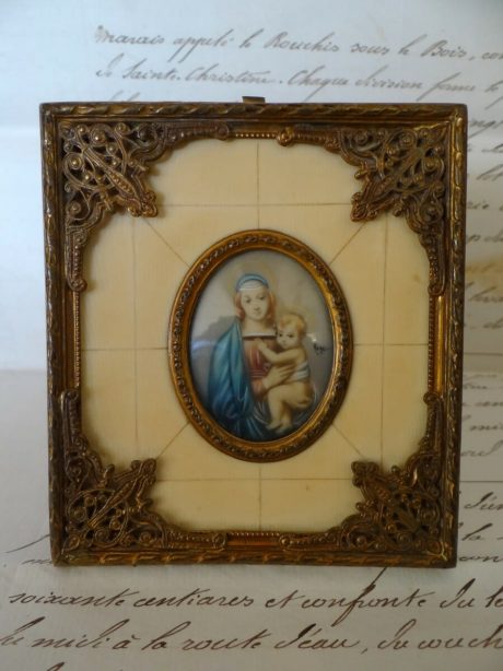 Miniature bronze and ivorine Madonna and child portrait