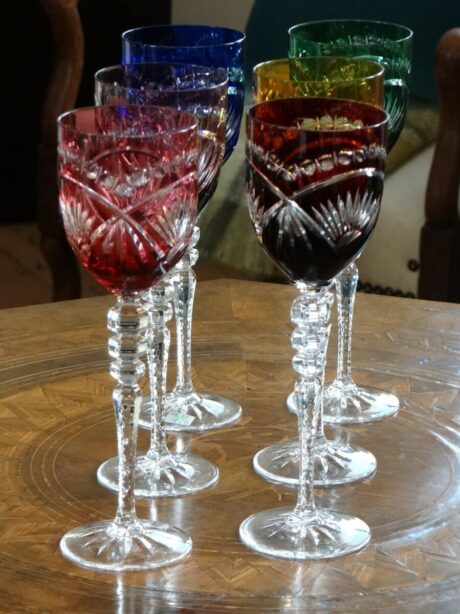 Set of six double cut coloured crystal wine glasses