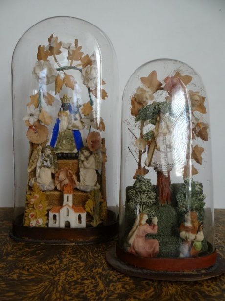 Pair of hand painted religious scenes mounted in antique domes