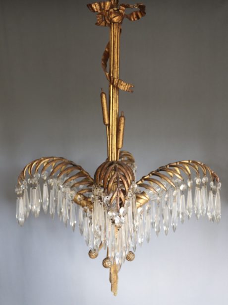 A pair of French Regency palm tree chandeliers