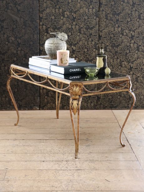 A Hollywood Regency Gilt iron coffee table