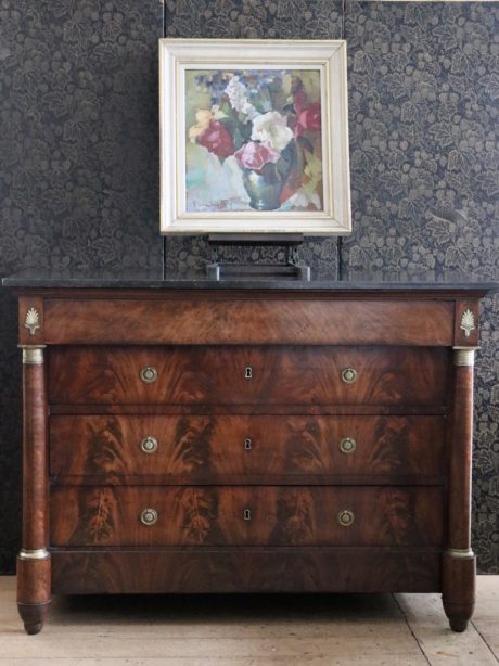 A French flame mahogany Empire commode c.1820