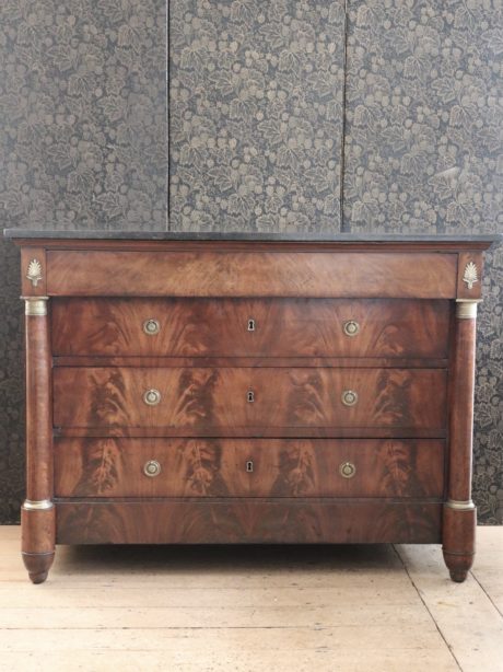 A French flame mahogany Empire commode c.1820