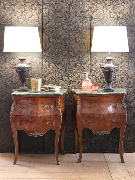 A pair of Louis XV style Bombe bedside drawers