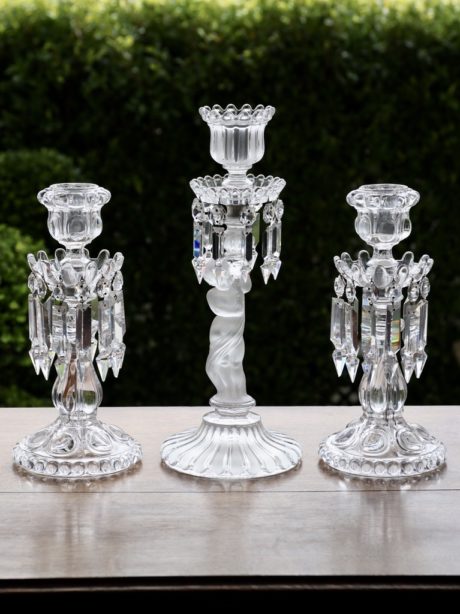 A trio of French crystal Baccarat hurricane lamps