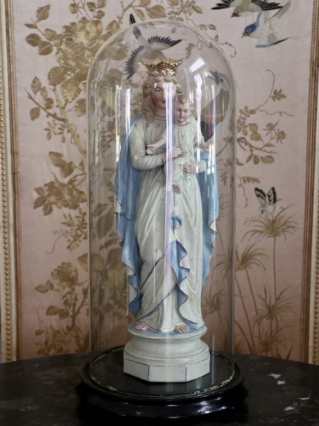 A Bisque porcelain Madonna and child statue