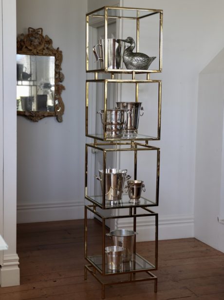 Polished brass and glass etagere shelving unit